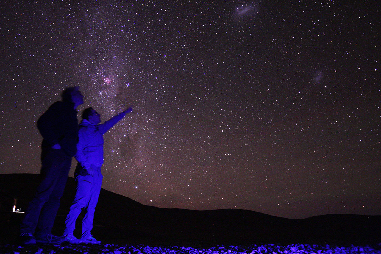 A colleague and me beneath the starry sky in Paranal